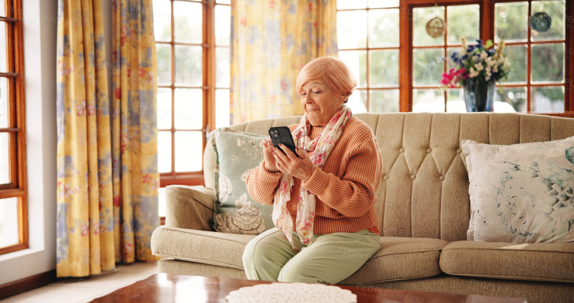 Buy stock photo Senior woman, good news and phone on sofa for email notification, tax rebate or online bet prize. Happy, old person and relax with smartphone in home for reading gossip story and lottery bonus winner