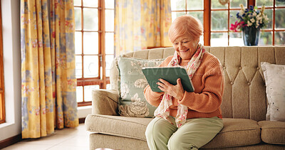 Buy stock photo Streaming, movie and senior woman with tablet, living room or watching series on web or retirement. Happy, pensioner and elderly person with tech for entertainment, online or relax with film in home