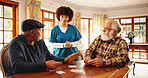 Senior men, talk and nurse for playing cards of contest, friendly competition and hobby. Caregiver, chat and elderly people with game for retirement entertainment, cognitive activity and nursing home