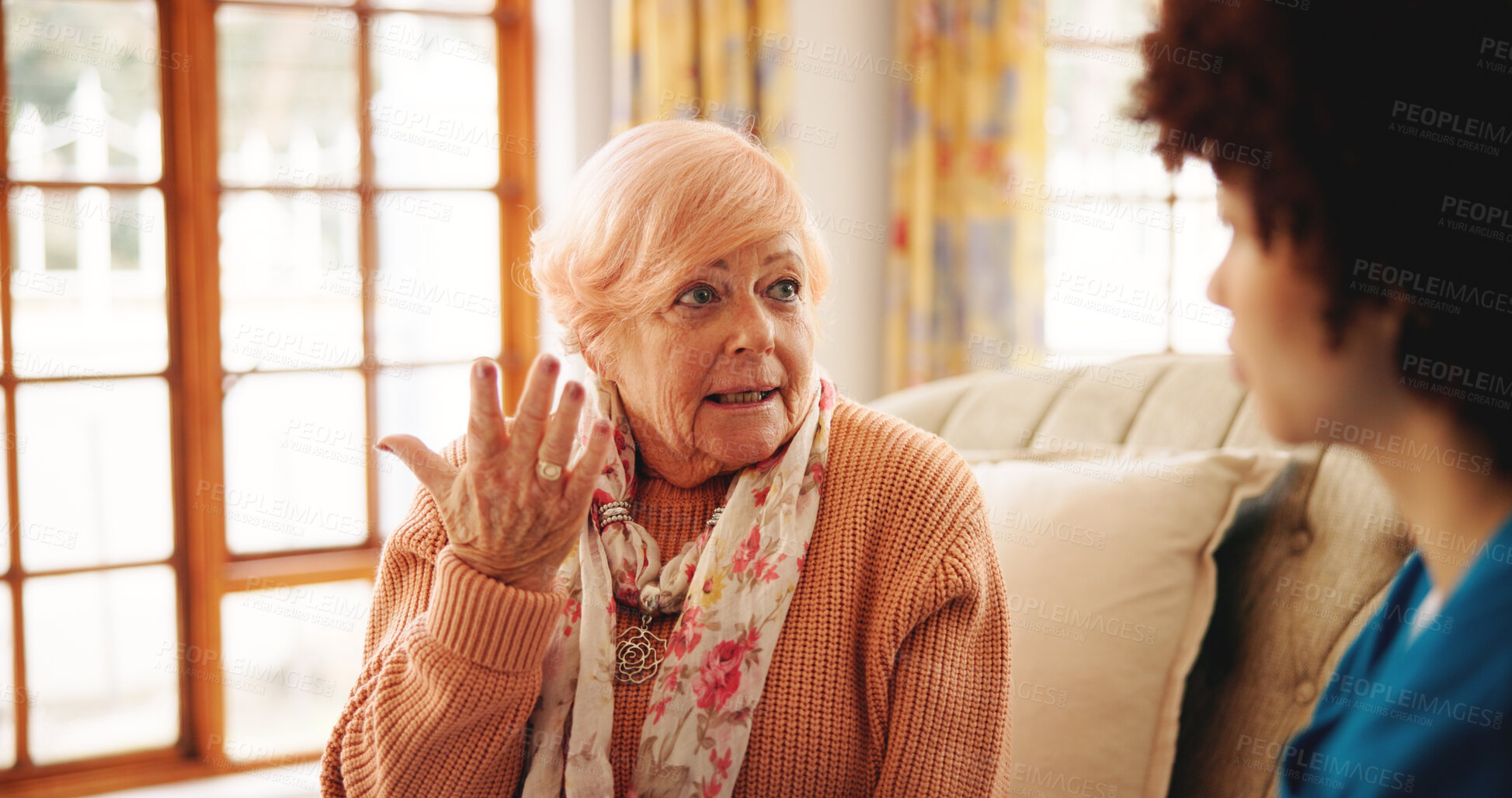 Buy stock photo Consultation, home and nurse with senior woman on sofa for diagnosis, checkup or treatment plan. Healthcare, conversation and medical caregiver with elderly female person for discussion at house.