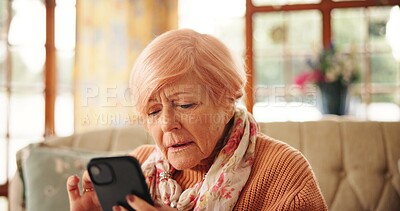 Buy stock photo Senior woman, reading and phone at house for message, communication and social media. Elderly person, confused and mobile with online games, browsing website and problem solving of crossword activity