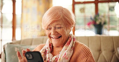 Buy stock photo Senior woman, smile and phone on sofa for bingo game, playing word search or online news. Retirement, relax and old person with smartphone in home for streaming service, reading ebook or web browsing
