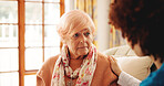 Discussion, home and nurse with senior woman on sofa for diagnosis, checkup or treatment plan. Healthcare, conversation and medical caregiver with elderly female person for consultation at house.