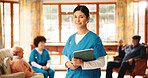 Woman, caregiver and portrait with tablet in nursing home for schedule, rehabilitation agenda and healthcare. Smile, nurse and medical professional with tech for digital support in elderly care