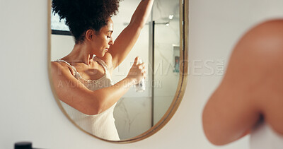 Buy stock photo Woman, deodorant and mirror for underarm, smell or clean armpit in home bathroom. Female person, skincare and reflection for fresh aroma, hygiene or perfume for wellness and morning routine fragrance