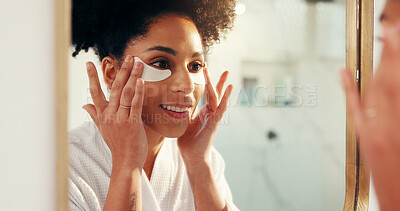 Buy stock photo Eye mask, beauty and woman by mirror in bathroom for hydration, glow or facial routine in morning. Skincare, wellness and female person with cosmetic product for dermatology treatment in home.