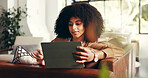 African woman, typing and tablet at house for email, design feedback and project schedule. Graphic designer, remote work and digital for art update, online research and information on web application