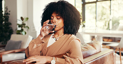 Buy stock photo Home, woman and drinking water for wellness, health or benefits for diet. Thirsty African person, hydration and glass in living room with mineral liquid for natural detox, nutrition or fresh beverage