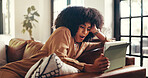 Shock, tablet and woman on sofa with online news, notification and reading gossip on social media. Home, relax and person on digital tech with surprise, wow and omg for drama, message and internet