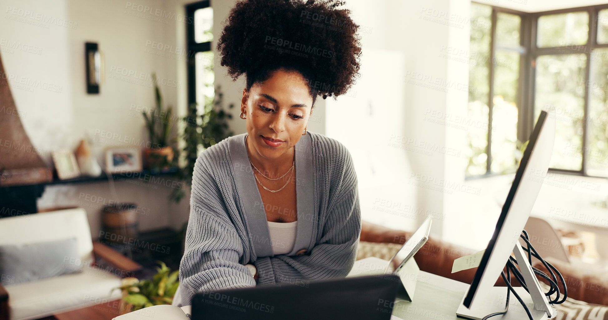 Buy stock photo Remote work, tablet and african woman with internet for reading or research for startup in home. Online, technology and person check sales on website for revenue or growth as freelancer at house