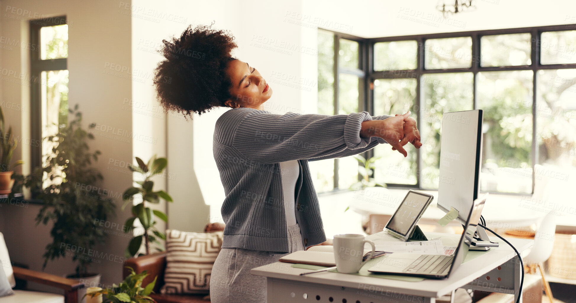 Buy stock photo Remote work, tired and african woman stretching by technology and desk in home office. Start, ready and person with agile management by computer screen, software tools and freelance project at house