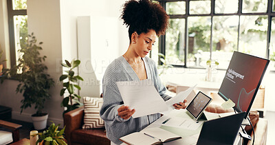 Buy stock photo Remote work, paperwork and african woman with technology and analysis in home office. Online, research and person reading document for agile management, planning and freelance project at house