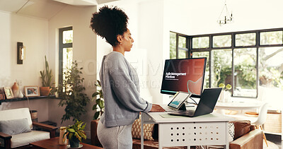 Buy stock photo Woman, computer and breathing with remote work from home at standing desk for agile management practices. African person, profile and deadline with screen, charts and multitasking with stats at house