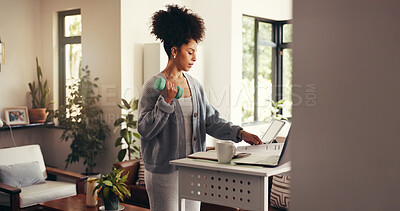 Buy stock photo Multitasking, remote work and woman with dumbbell, laptop or standing desk for project and wellness. Serious, journalist and African person with equipment for exercise, freelancer or fitness in house