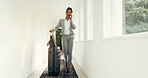 Business, woman and phone call with luggage in lobby of discussion, travel schedule and work trip. Female person, suitcase and mobile for client chat, agenda and contact feedback for conference event