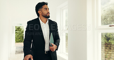 Buy stock photo Thinking, real estate agent and man in house, serious or idea for investment property or inspection. Confident, reflection and person in home for listing, realtor and preparing for showing or sale