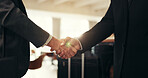 Shaking hands, deal and business men in office with partnership, agreement or collaboration. Corporate, welcome and male finance manager with client for handshake on investment contract in workplace.