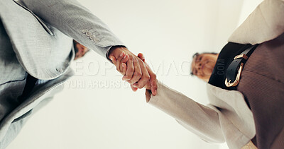 Buy stock photo Handshake, low angle and business people at office for interview, welcome and agreement at agency. HR manager, employee and shaking hands for hiring, onboarding and recruitment process at company