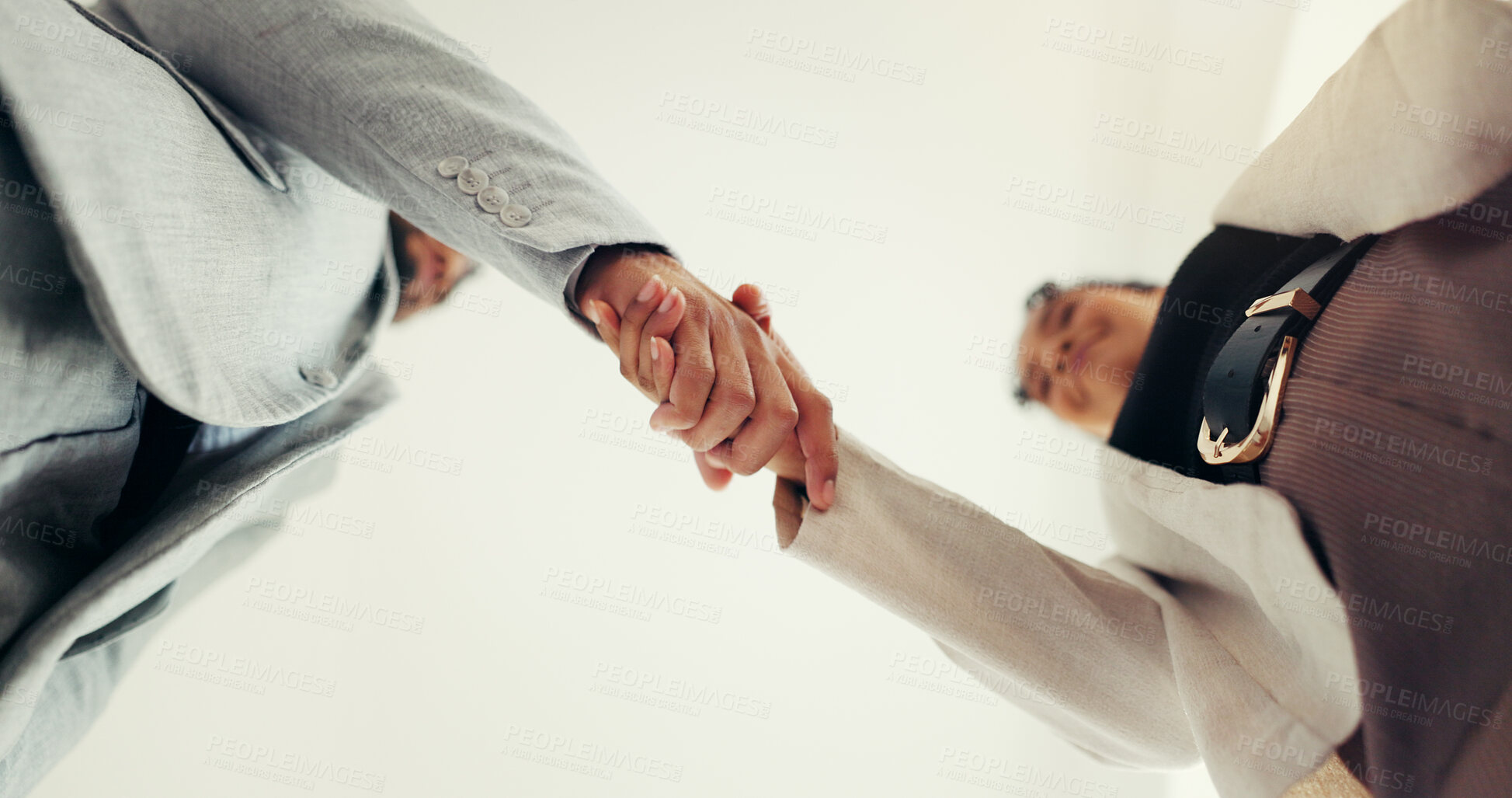 Buy stock photo Handshake, low angle and business people at office for interview, welcome and agreement at agency. HR manager, employee and shaking hands for hiring, onboarding and recruitment process at company