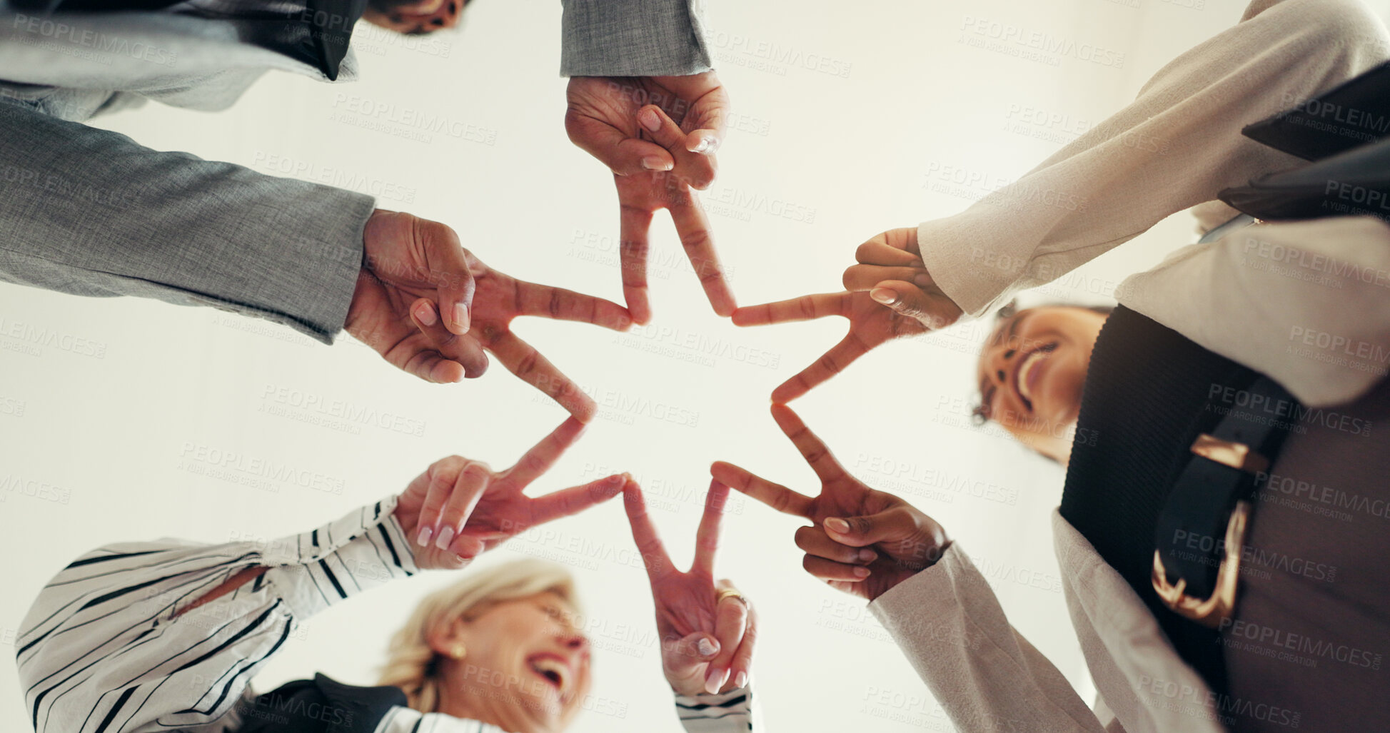 Buy stock photo Star fingers, circle and business people with team motivation, low angle or smile for goals, symbol at office. Team, employees and hands in huddle, peace sign or emoji for collaboration at agency