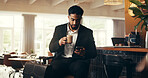 Businessman, coffee and phone with luggage in hotel cafe for travel, check in or accommodation. Man, customer or traveler waiting with mobile smartphone for caffeine drink, latte or espresso in lodge