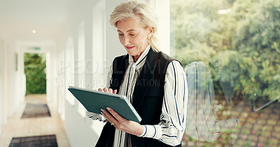Buy stock photo Business, woman and reading on tablet at house for research, email client and selling property. Mature realtor, digital or web for real estate sales, review information and schedule viewing of rental