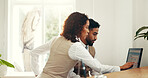 Hotel, receptionist and colleagues with computer, collaboration and research for reservation on web. Online, man and woman with tech for registration info, teamwork and planning for schedule in motel