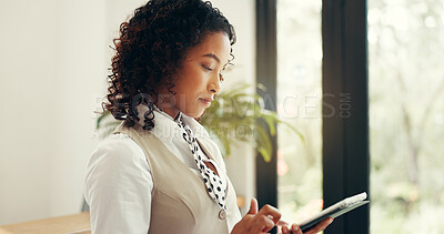 Buy stock photo Hotel, receptionist and woman with tablet, serious and checking reservation on website and schedule. Motel, concierge and person with tech for booking info, update and research for request on app