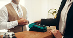 Hands, credit card and transaction with machine at hotel, concierge and booking with hospitality service. People, receptionist and tap at help desk with fintech, easy payment or reservation at lodge