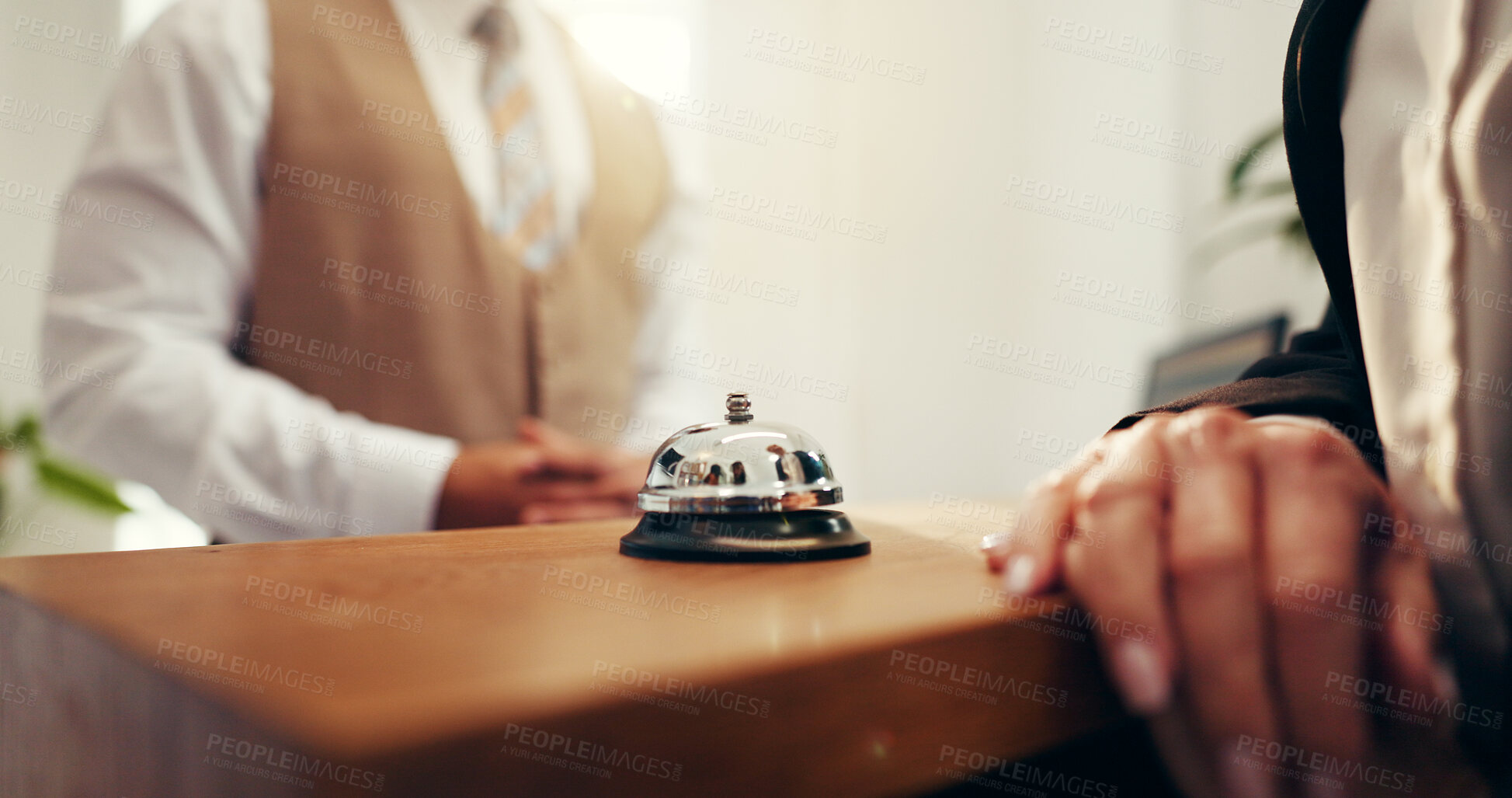 Buy stock photo Customer, hands and concierge with service bell for request assistance or help in hotel. Closeup, client or people with alert on front desk for response, question or accommodation in luxury resort