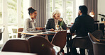 Hotel lounge, team and business people in meeting for finance project and travel with coffee. Smile, corporate group and conversation for investment trip, collaboration or hospitality discussion