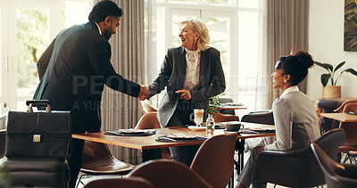 Buy stock photo Handshake, smile and business people in cafe, hello and support with luggage, agreement and welcome. Group, employees and consultant in office, shaking hands and partnership with greeting or suitcase