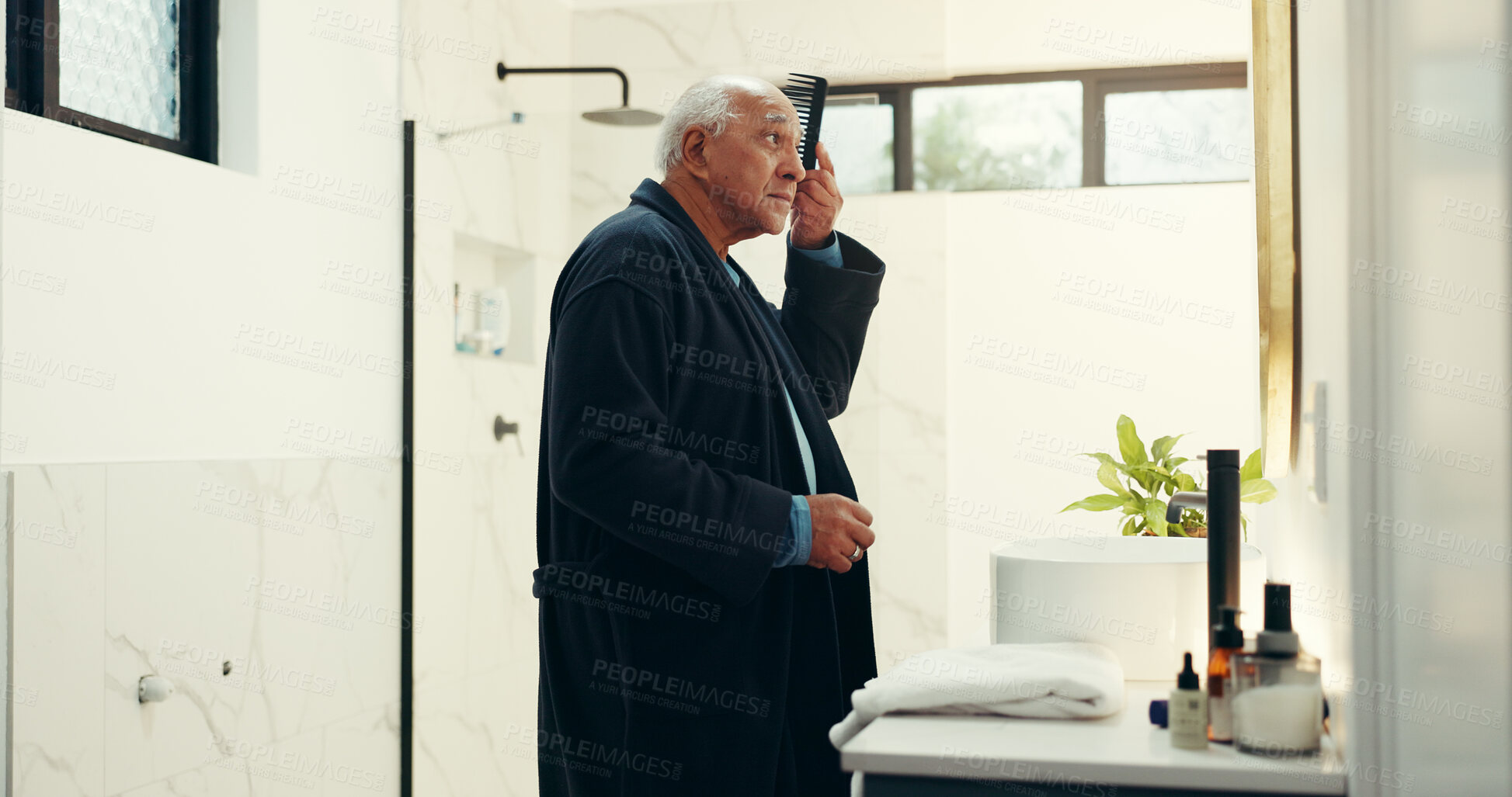 Buy stock photo Senior man, comb and brush hair in bathroom for beauty, healthy growth and grooming routine. Elderly person, mirror and cosmetic tools for scalp treatment, collagen benefits and texture glow at house