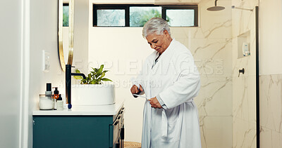 Buy stock photo Bathrobe, morning and senior woman with smile, start day and confidence with wellness. Pensioner, house and elderly person with comfort, happiness and break with hospitality, resort and retirement 