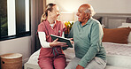 Happy, nurse and tablet with senior man for good news, medical report and diagnosis results. Digital, caregiver and elderly person for consultation, insurance cover and treatment progress at house