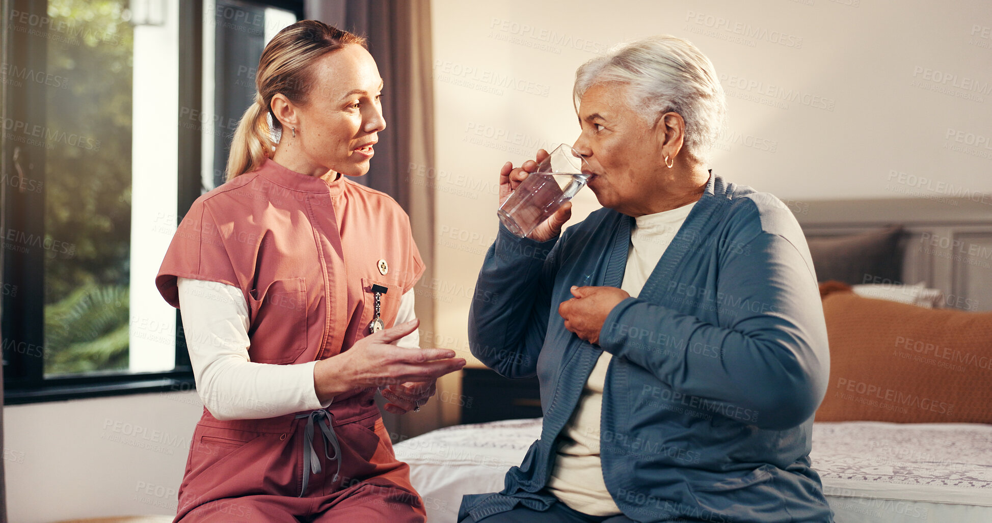 Buy stock photo Home, nurse or old woman with conversation, water and vitamins with wellness, supplements or smile. Pensioner, prescription or caregiver with recovery, antibiotics or health with safety or hydration