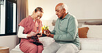Nurse, blood test and diabetes with old man in bedroom for medical, advice and support. Consulting, glucose levels and healthcare with caregiver and patient in nursing home for retirement and monitor