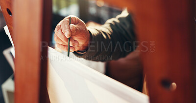 Buy stock photo Hands, elderly person and painting on canvas for art, drawing design and sketch artwork. Artist, senior man and paintbrush with easel for craft, DIY activity and talent for creative project at house