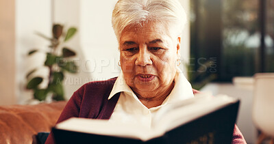 Buy stock photo Relax, reading and senior woman with bible in home for worship, faith and spiritual wellness. Christian, religion and elderly female person with studying holy book for learning gospel in living room.