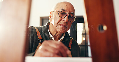 Buy stock photo Senior man, home and painting for art with easel for creative self expression, talent and craft. Retirement hobby, artist and canvas for artwork, inspiration and elderly person drawing in house