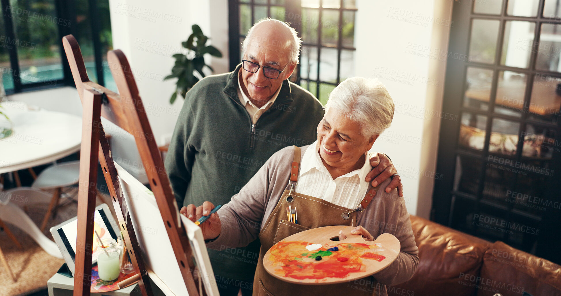 Buy stock photo Smile, senior couple and painting on canvas for art, drawing sketch and bonding together. Above, elderly people and help of partner for craft artwork, creation and talent for retirement hobby in home