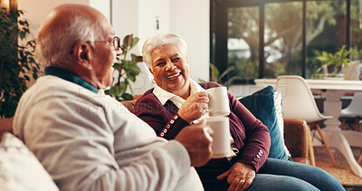 Buy stock photo Coffee, relax and senior couple on sofa in home with conversation, bonding or laughing together. Happy, cappuccino and elderly man with woman for retirement in living room for calm morning in house.