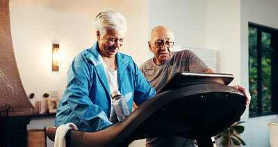 Buy stock photo Old couple, treadmill and help for exercise in home, walk and support with training in retirement. Senior man, woman and discussion with gym equipment, machine and steps with fitness in house