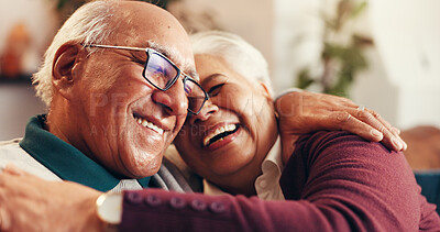 Buy stock photo Elderly couple, hug and laugh in home for love, connection and bonding together to relax. Embrace, senior man and woman in living room with happiness, healthy relationship and loyalty in retirement