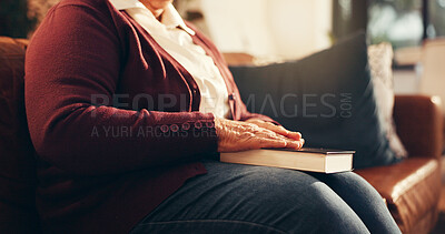 Buy stock photo Praying, hands and bible with old woman on sofa for worship, gratitude and peace. Religion, spiritual connection and faith with person and book in living room of home for trust, holy text and belief