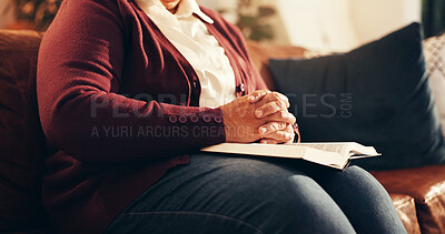 Buy stock photo Religion, hands and bible with old woman on sofa for worship, gratitude and peace. Praying, spiritual connection and faith with person and book in living room of home for trust, holy text and belief