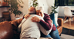 Senior couple, love and hug in home for care, connection and bonding together to relax. Embrace, elderly man and woman in living room with commitment, healthy relationship and loyalty in retirement