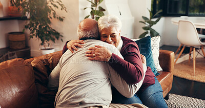 Buy stock photo Senior couple, love and hug in home for care, connection and bonding together to relax. Embrace, elderly man and woman in living room with commitment, healthy relationship and loyalty in retirement