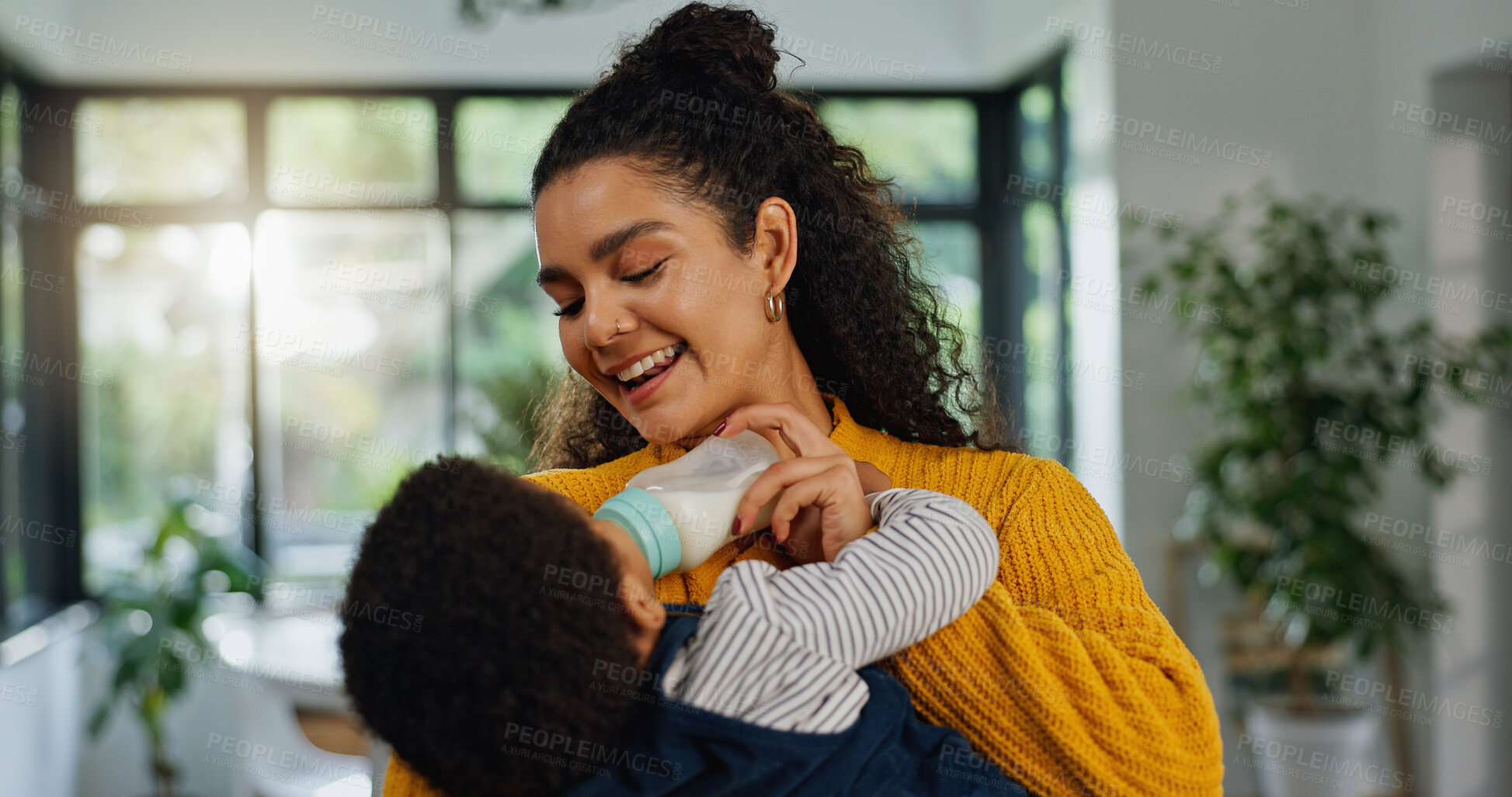 Buy stock photo Home, mother and baby with bottle, smile and bonding together with nap time, wellness and care. Apartment, parent and mama with infant, child development and feeding with nutrition, growth and love