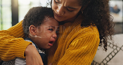 Buy stock photo Crying, comfort and mom with child on sofa with pain for teething, growing and development in home. Family, living room and mother with upset, sad and frustrated baby for care, console and support